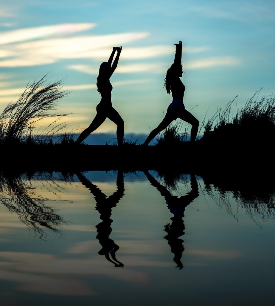 women, yoga, silhouettes, water, reflection, mirroring, water reflection, pose, posing, yoga pose, meditation, stretching, wellness, well-being, exercise, adults, asia, girls, morning, outdoors, pair, people, nature, stance, sunrise, sunset